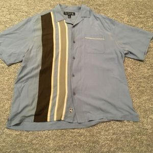 A short sleeve button down Nat Nast shirt